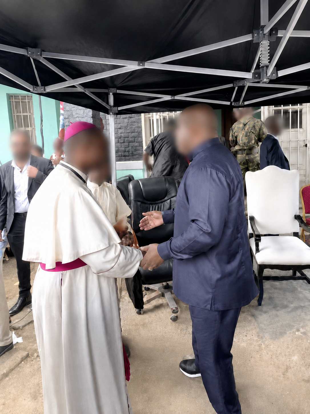 Close protection officer supporting a head of state during an official engagement in Central Africa
