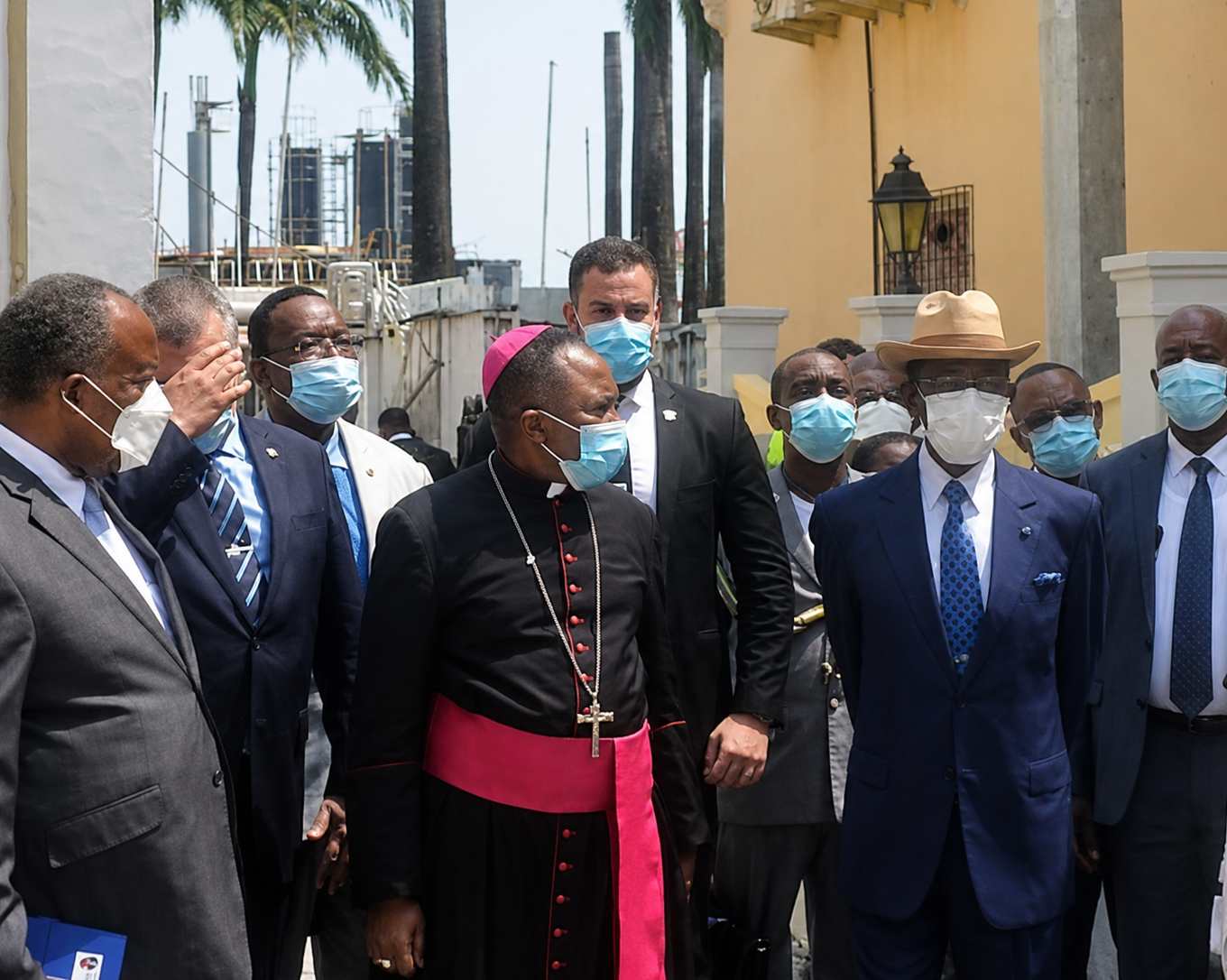 Close protection officer accompanying officials during a state ceremony and official visit